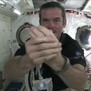 Astronaut Hand Washing